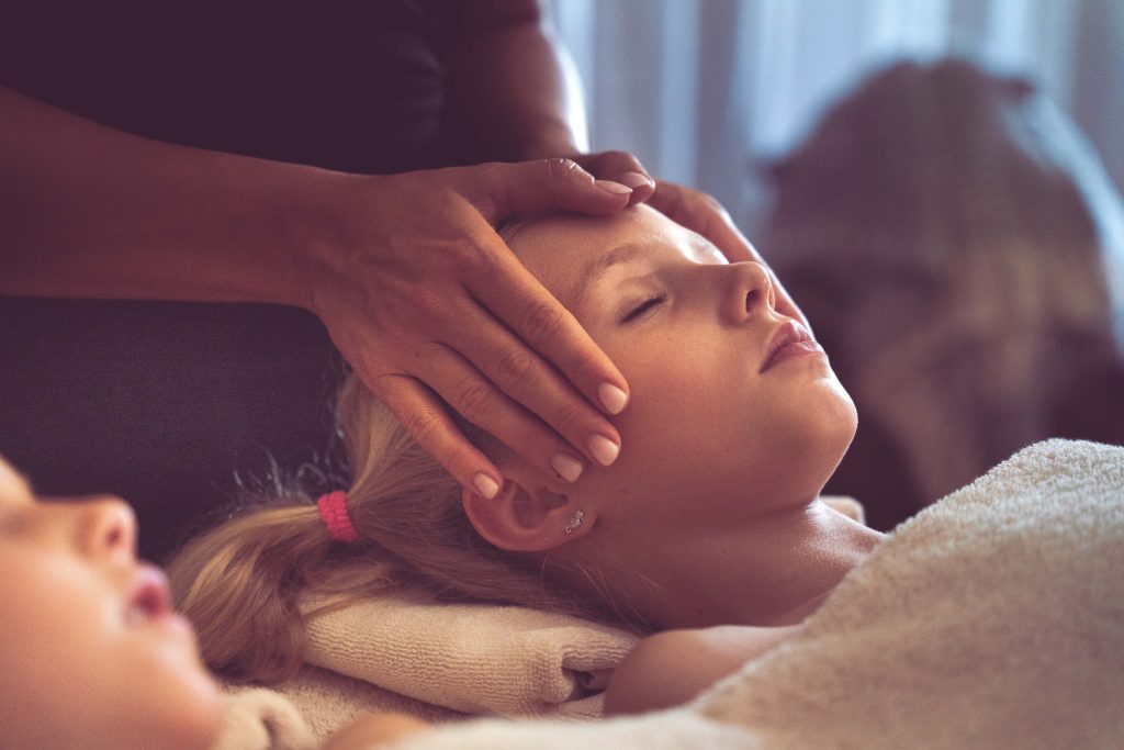 little girl enjoying a treatment at the espace bien-être - massage honfleur